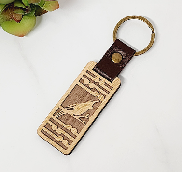 Bamboo Keyring:Tui + Koru (krtkr)